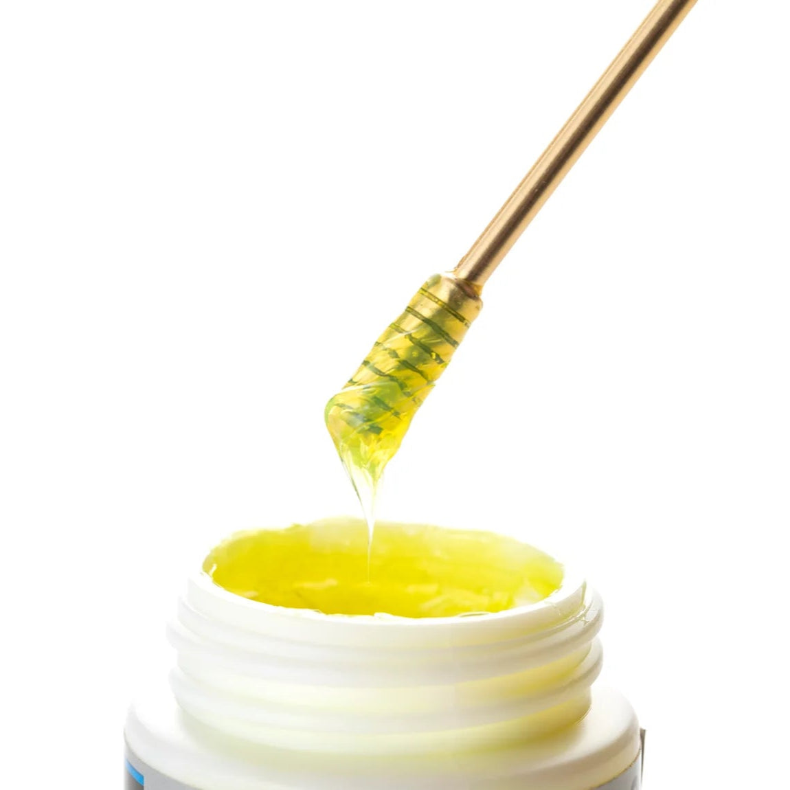 Grease dipper in action in shimano yellow grease