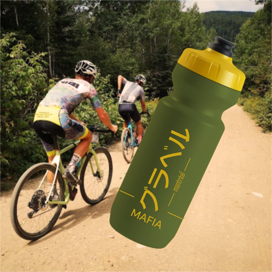 Green GRAVEL MAFIA bidon rendering on a gravel ride photo background, back of the bottle