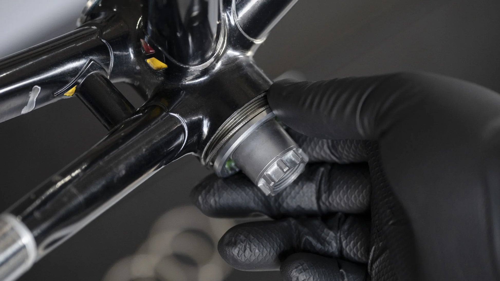 Hakurin stainless spacer being used on a track fixed gearbottom bracket to adjust chainline