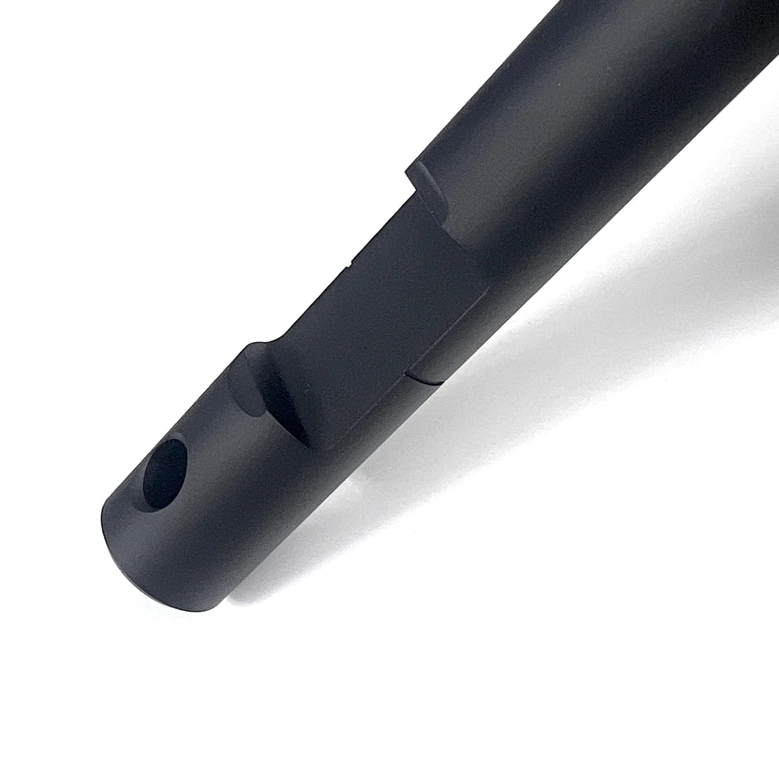 Product photo of a track chainline checker, close-up on the alignment notch