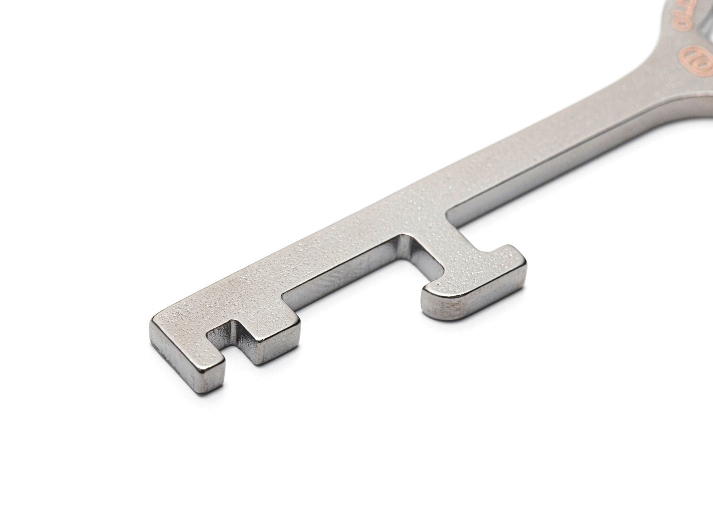 Keychain multi-tool key with 10mm wrench, spoke nippe and bottle opener