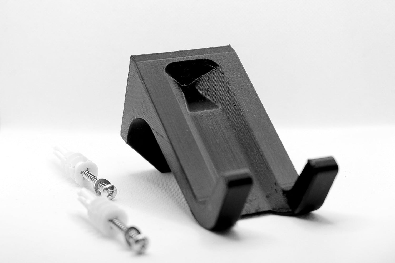 Wall mount for bicycle display, black with fixation hardware, tidy elegant, minimalist