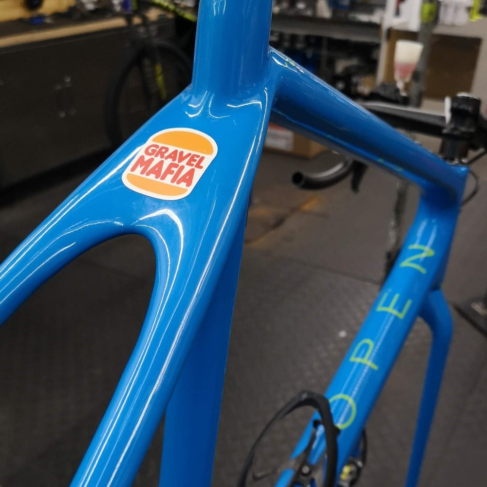 Gravel Mafia Sticker on a Blue Open UP bicycle frame