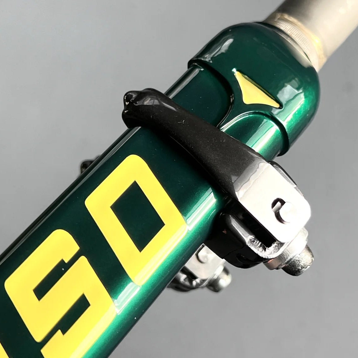 Set of MAX fork bracket installed on a MAX NJS track bike fork. For road brake caliper installation