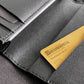 Runwell Gauge 42Si stored in a wallet credit card slot