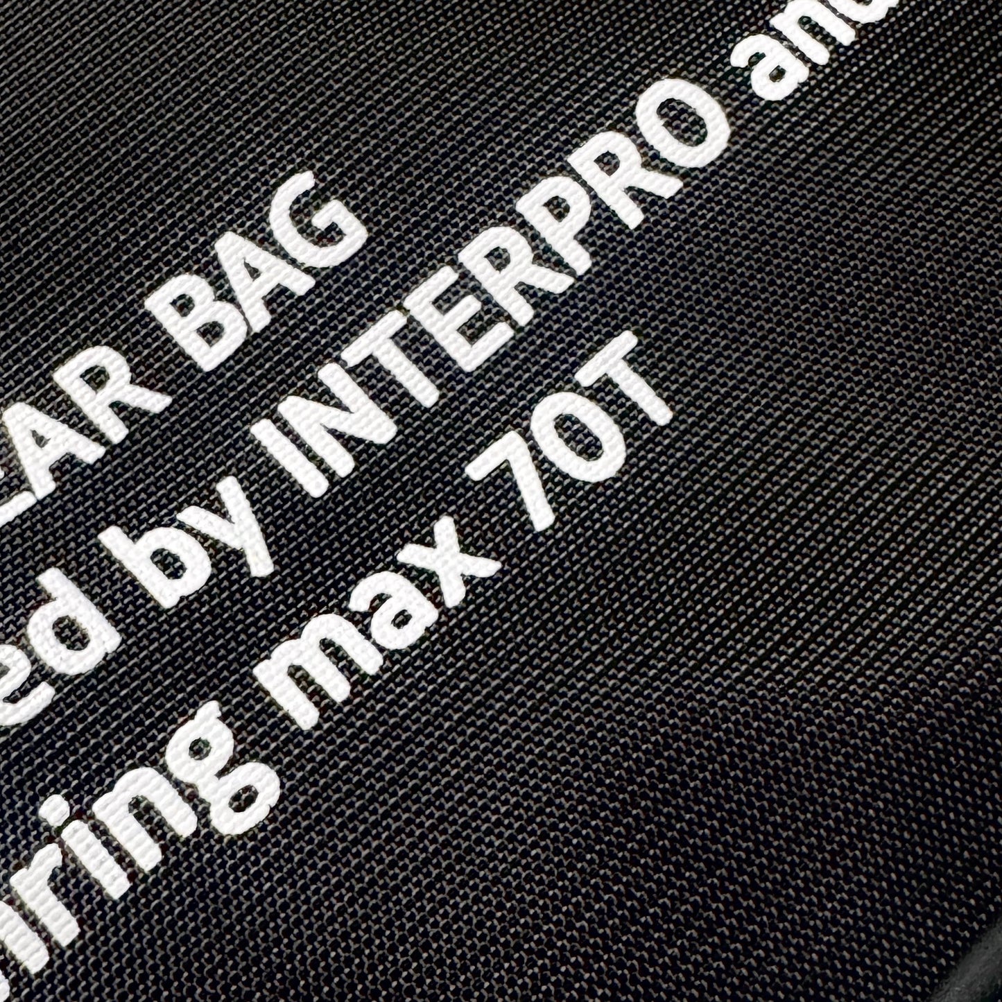 Black chainring gear bag with white text indicating it is designed by INTERPRO and Runwell and has a max chainring size capacity of 70T.