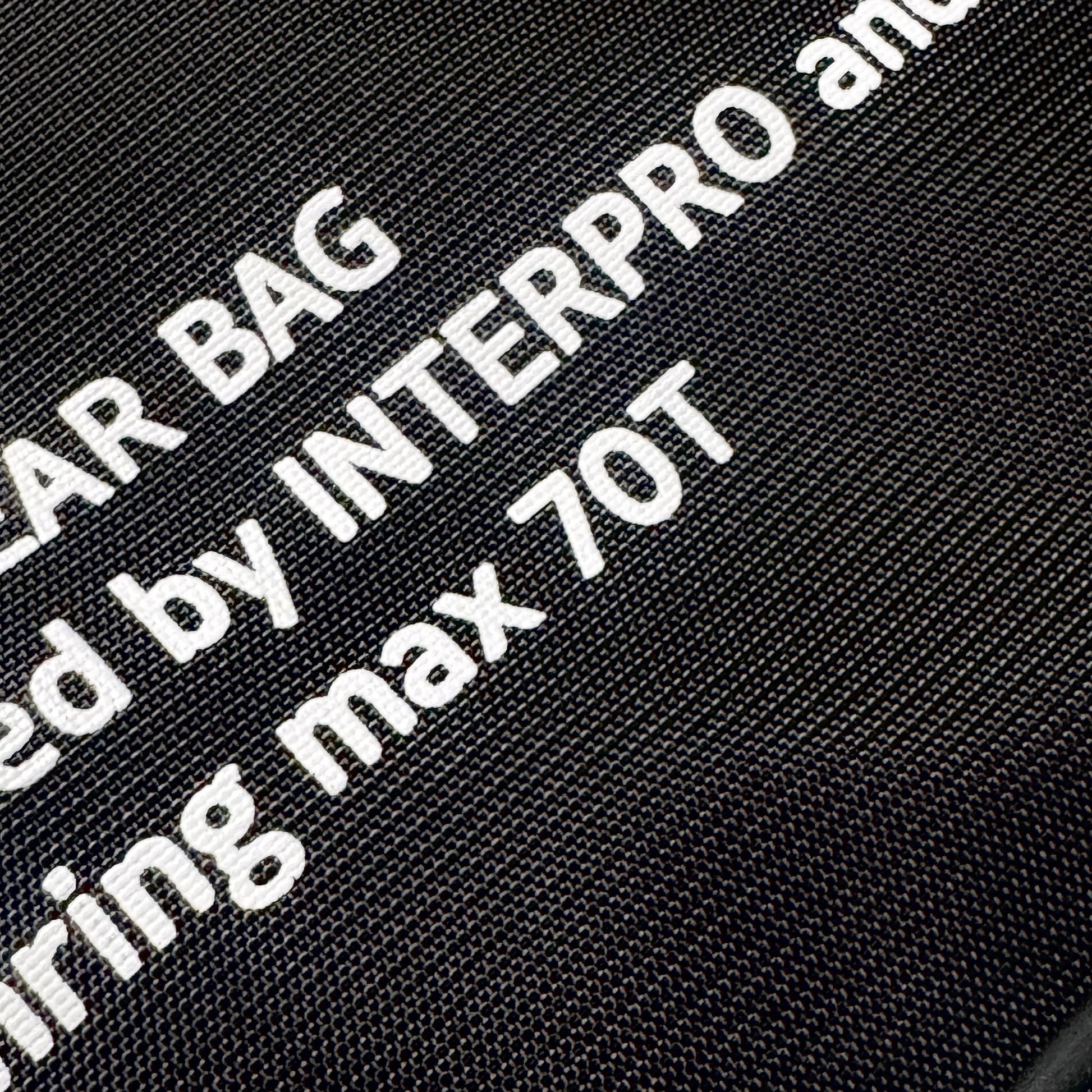 Black chainring gear bag with white text indicating it is designed by INTERPRO and Runwell and has a max chainring size capacity of 70T.