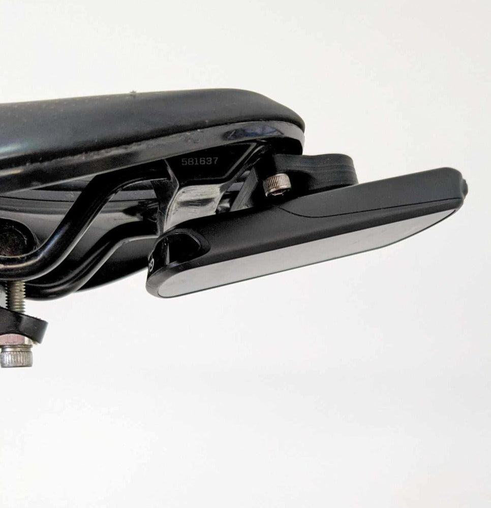 Saddle rear attachment adaptor for SWAT Specialized saddles, comes with Garmin receiver, as picture, or Wahoo receiver. 