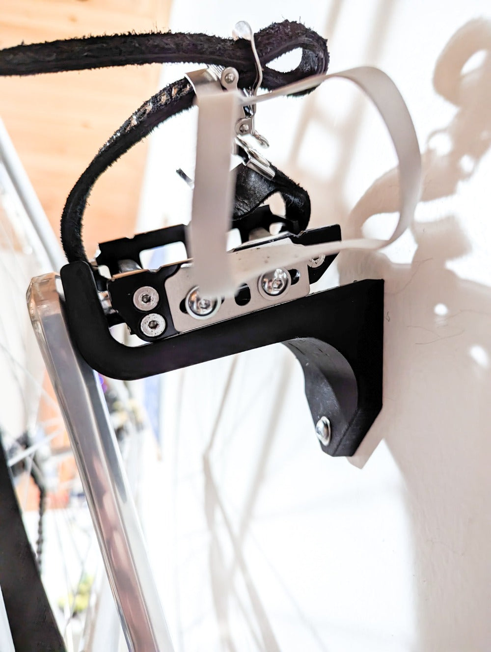 Wall mount for bicycle display, white with fixation hardware, tidy elegant, minimalist, NJS track bike